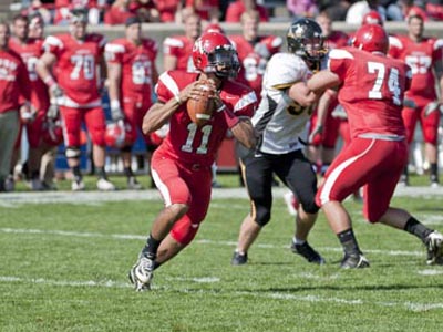 Cardinals Tame Huskies in Homecoming Game, 43-31
