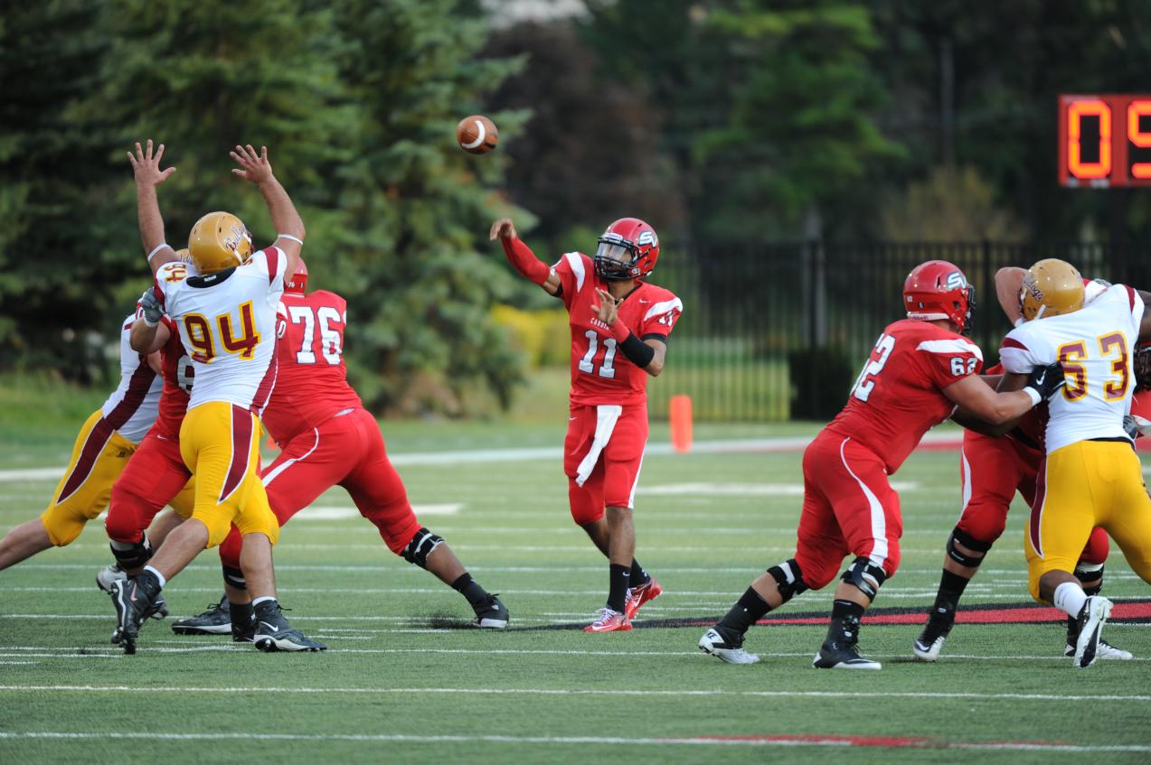Cardinals Survive Storm in Road Opener, 35-20