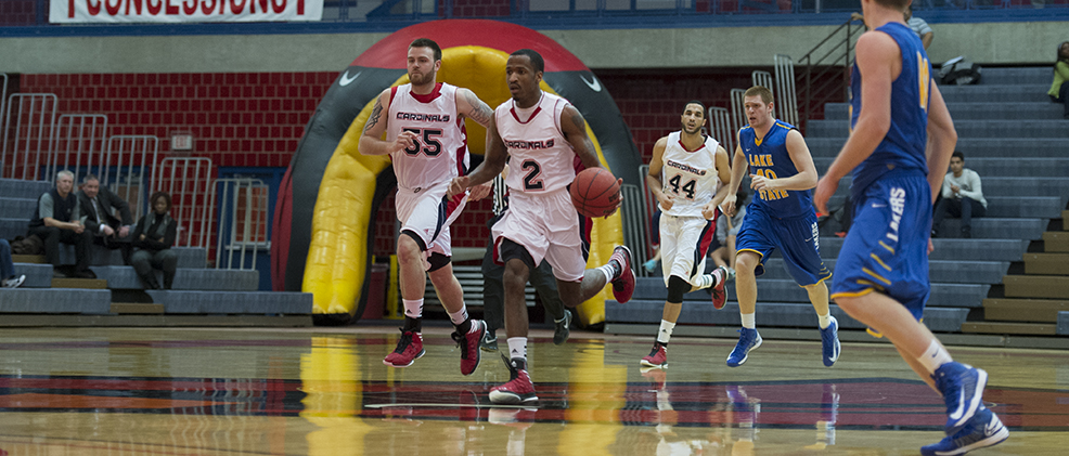 Cardinals Tame Wildcats, 56-51