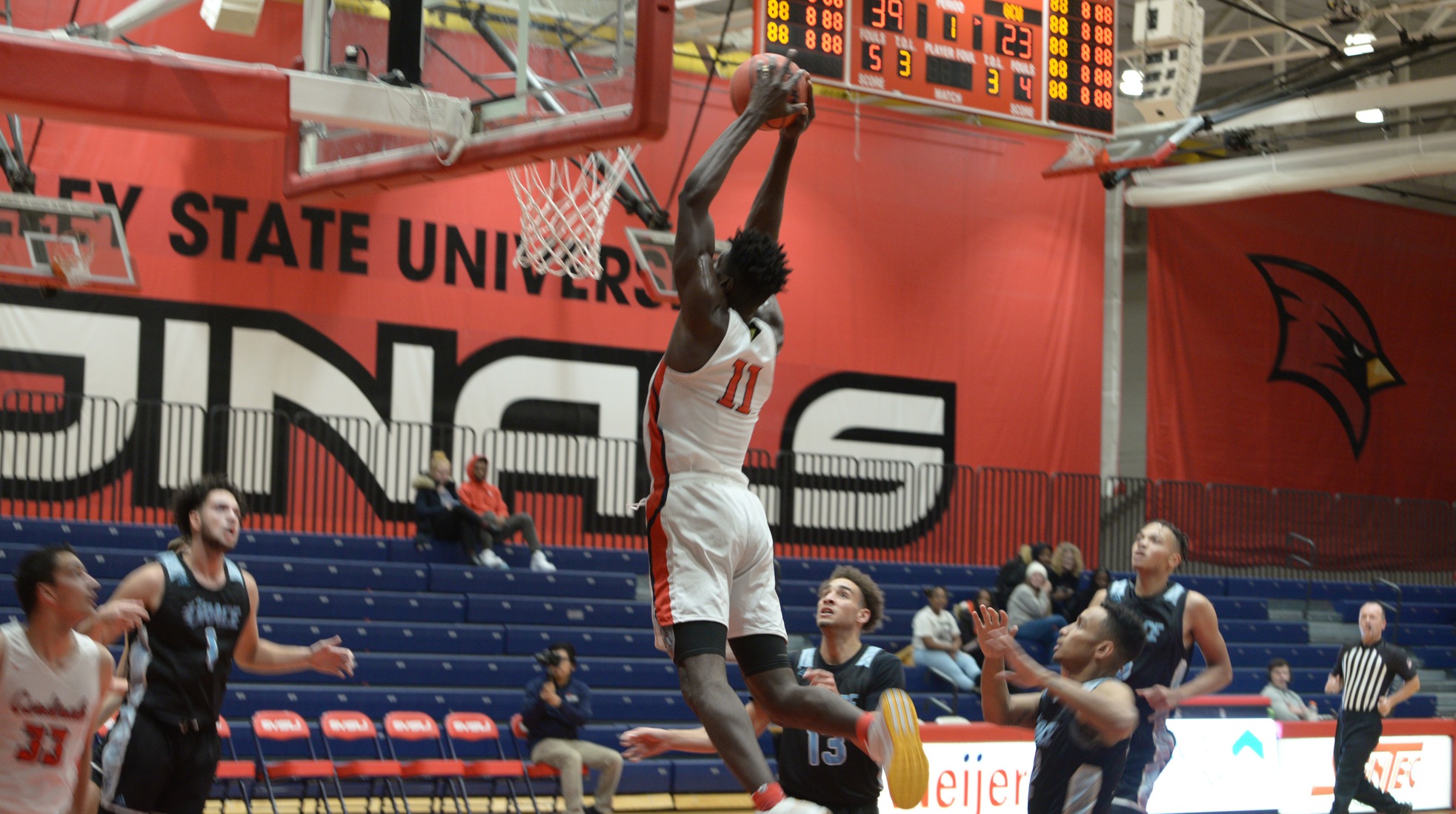 Cardinals cruise to victory over Tigers in home opener
