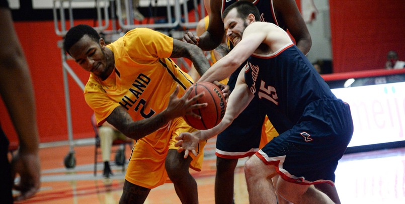 Cardinal men drop close battle to Eagles 58-57